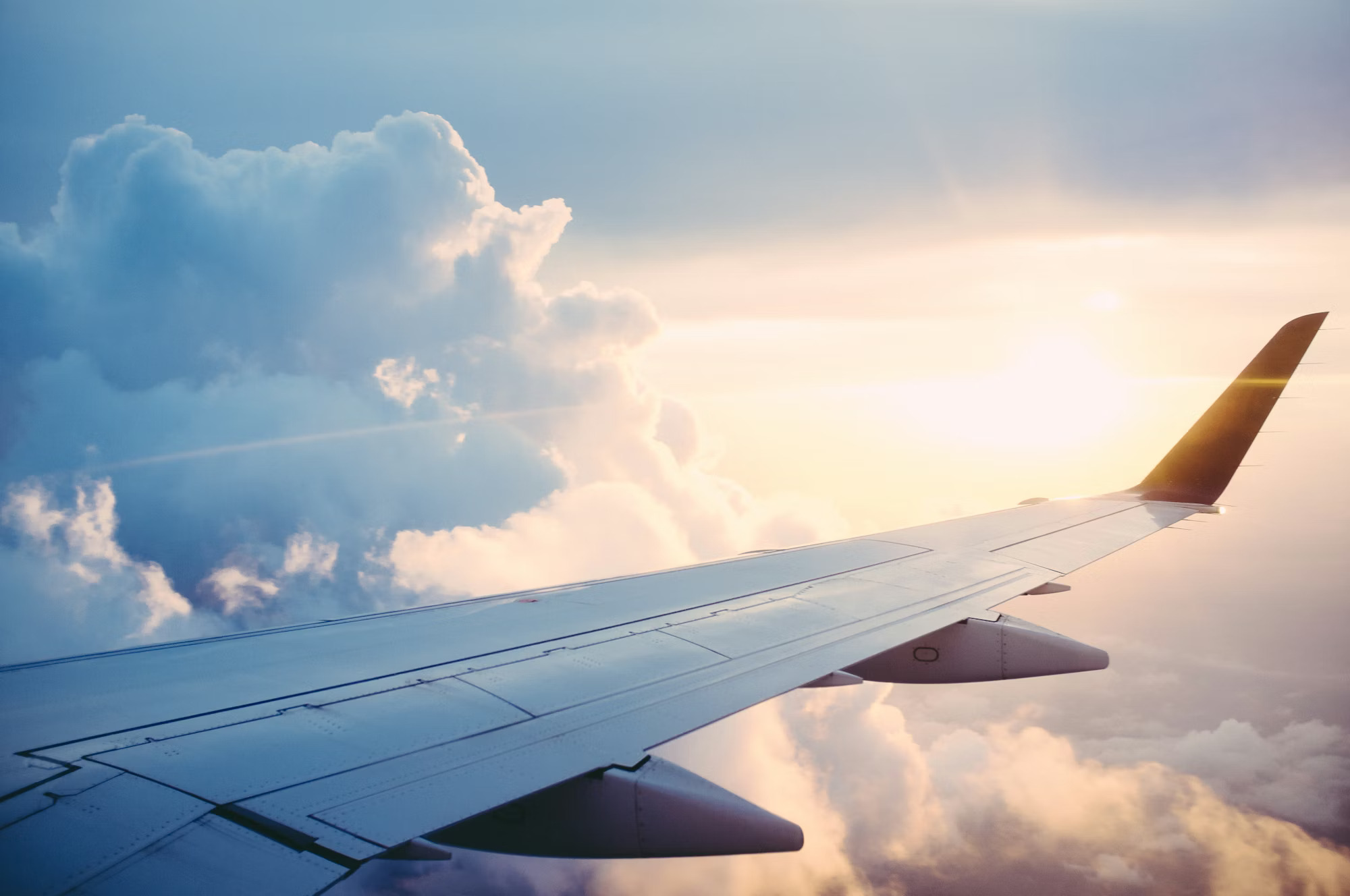 Aerial cargo plane over clouds